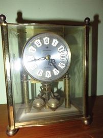 Antique brass mantle clock