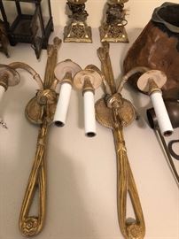 Lots of wall sconces and lighting