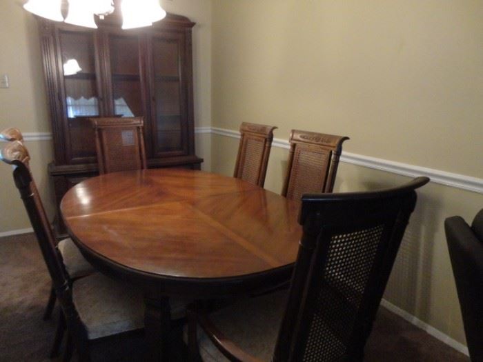 Dining room set with 4 side chairs and 2 armed chairs and china cabinet