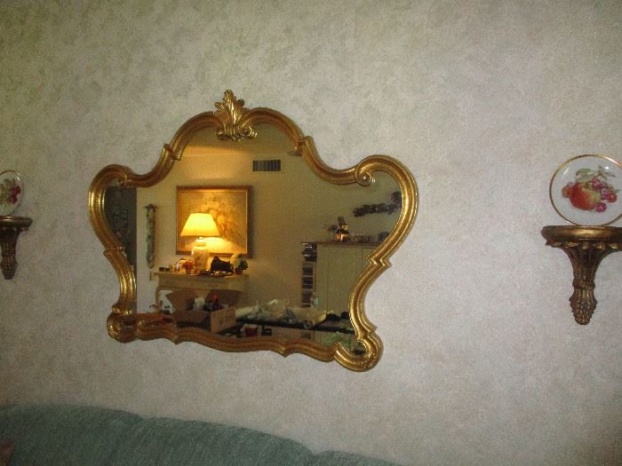 Ornate mirror over couch