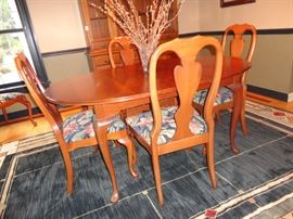 Elegant dining room table set with six chairs