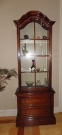 Elegant curio cabinet made by Brandt