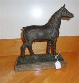 Cast metal stallion horse door stop - unfortunately he's lost his tail - but still a handsome item!