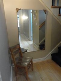 Large antique mirror with child's oak chair