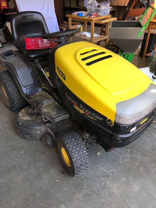 Stanley Riding Lawn Mower, 19 HP, with a 46 inch deck.  The owner verified that this does run, the battery just needs to be charged.  