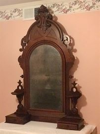 Antique standing mirror has aged to perfection. 