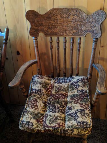 NOTICE THE DESIGN ON BACK OF THIS ANTIQUE CHAIR