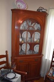 Antique Wildwood Cherry Corner Cabinet filled with a Gorgeous Winterling China Set