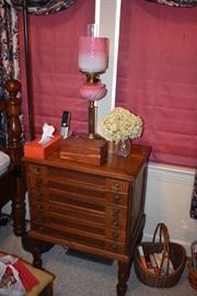 Gorgeous Antique 6 Drawer Cabinet with Burled Wood and Tudor Legs plus Beautiful and Rare Banquet Table Lamp with Swirl Design Milk Glass and Pink Shade with Pink Glass Bowl and Corinthian Brass Base and other Accessories