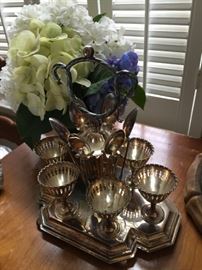 Silver cups and spoon set.