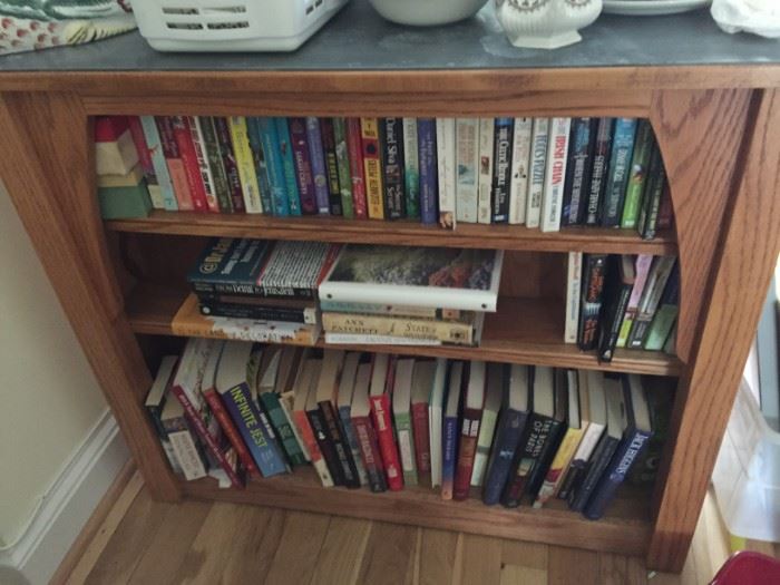 Dual Sided Kitchen Island and Assorted Books.