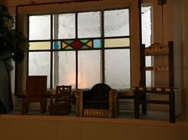 Stained Glass and Miniature Chairs.