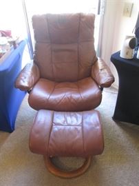Ekornes Rust-colored Recliner with Ottoman - shows some wear