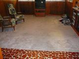 Neutral area rug in good condition. approx 13 x 16 ft.