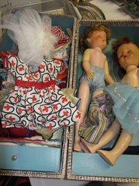 Vintage Doll in case with clothes