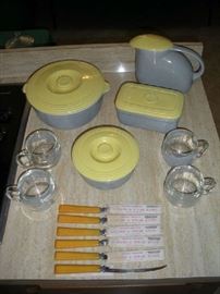 Kitchen:  The yellow/grey items are GENERAL ELECTRIC "Hall" refrigerator-ware.  Also shown is a set of four vintage NESTLE Nescafé clear glass globe coffee mugs and six HENRY'S original butterscotch bakelite handle "tomato & steak knives." The one knife has its sheath removed so you can see its blade.