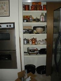 Kitchen:  The pantry has even more vintage kitchen items, including two glass l/2 gallon FOSTER FARMS ALL JERSEY MILK (Modesto, California) containers; and more baking and cooking items. 