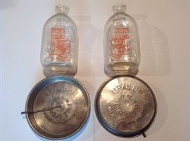 Kitchen:  Shown are the two "Foster Farms All Jersey Milk (Modesto, CA)" milk bottles and two collectible vintage metal cake pans advertising "Up and Up Self Rising Cake Flour" (George Urban Milling Company, Buffalo, NY).