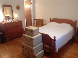 Bedroom #1 (Master):  Vintage "BALKAN Aero-Light"  luggage (each piece is priced separately) is at the foot of the BURNS maple full-size bed.  The SERTA mattress set and chenille bed spread are also for sale.  To the left is a matching BURNS maple three-drawer dresser/mirror and a collection of milk glass.   There are more BURNS maple pieces in this room...keep going.  Each piece is priced individually.