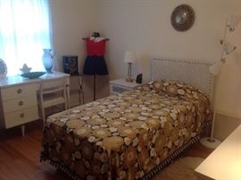 Bedroom #3:   The vintage desk and chair are now shown.  To the left of the twin bed (which matches the one in Bedroom #2) is the mid-century night stand with black/white drawer panels.  Also shown are various other mid-century items:  black metal two-shelf stand; a mid-century modern white metal/brass bullet floor lamp; and a vintage AIRGUIDE barometer/thermometer/humidity horoscope zodiac (with its original box).  The closet in this room has lots of children's vintage clothing. One outfit is displayed on the wire dress form in the corner but a sample of other outfits is coming up!