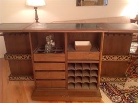 Living Room:  This is the back side of the bar.  Notice the compartments for decanters, three drawers, ice bucket, wine bottle rack and storage racks on each side door.  