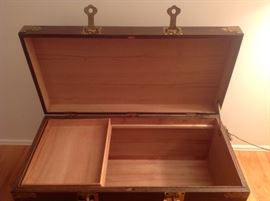 Living Room:  The trunk is now open to show the inside  The tray slides on the wooden rails.