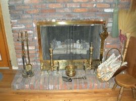 Family Room:  Brass fireplace tools, andirons and other fire-place related items are for sale.