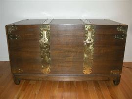 Living Room:  The elegant brass trim wooden trunk measures 40" wide X 20" deep X 23" tall.  Additional photos follow.  