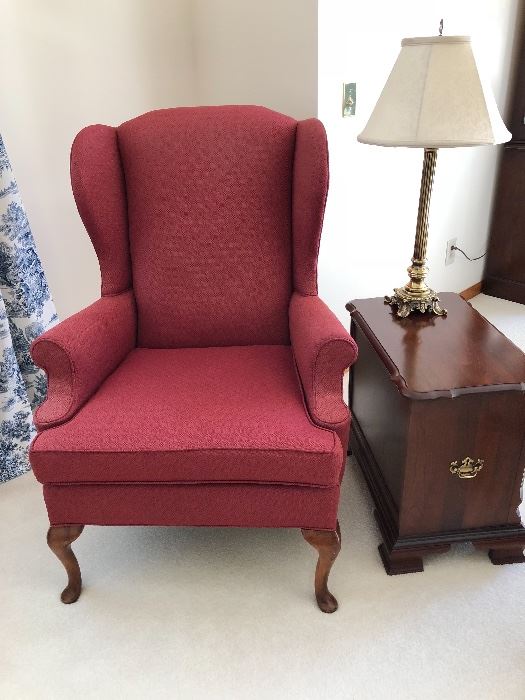 Red wing backed chair!  Adds a spark to your decor!
