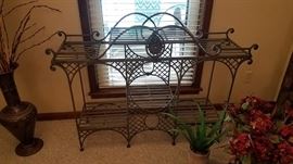 Wrought metal six-shelf stand