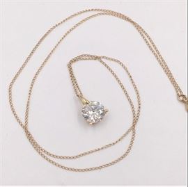 14K gold chain and setting with approx. 2 carat brilliant CZ stone.