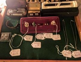 fine jewelry:  925 silver, 18K gold plate, 18K gold filled, 14K gold, diamon earrings, & cats eye earrings   -- DINING ROOM