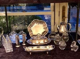 Silverplated serving pieces, water carafes, Heavy lead crystal salt and pepper.