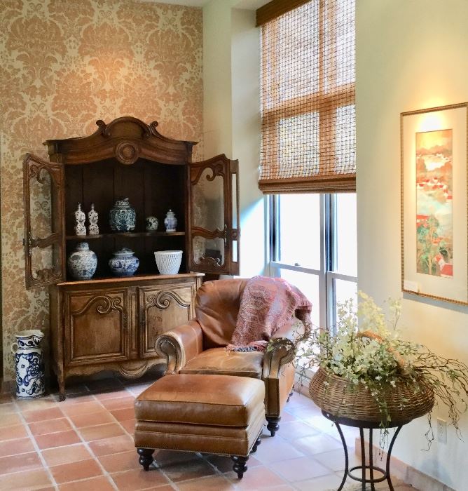 Antique pine buffet Louis XV
France circa 1800. Carved Pine, two carved glazed doors atop carved panel doors. Leather Chair and Ottoman