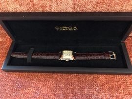 CIRCA timepiece. 23kt gold plated. 