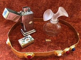 Vintage Christian Dior belt. 
Zippo 4 barrel, 2 steps table lighter, Bradford Pennsylvania.