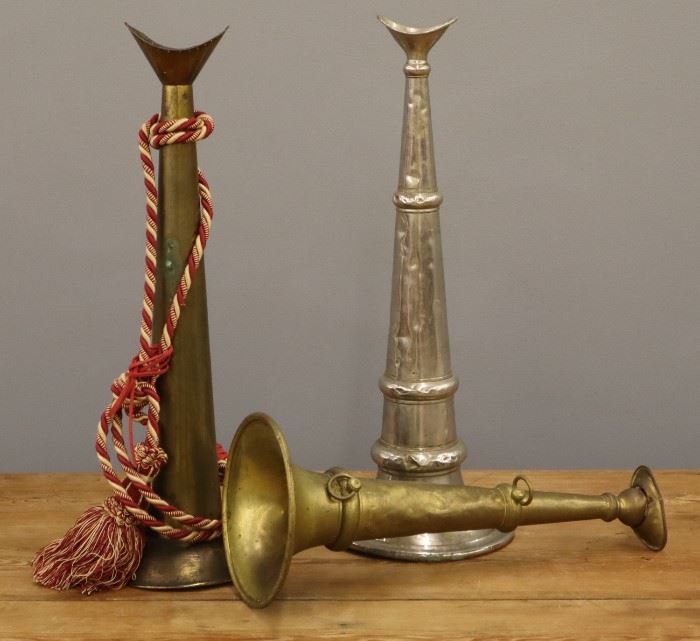 Three Vintage Brass Fire Horns.  One with nickel plated finish.  Some wear and denting, small splits.  Up to 19 1/4" long. 