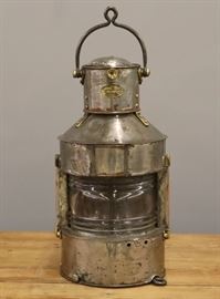 An early 20th century Steel Ship's Lantern by Telford, Grier, & Mackay Ltd.,  16 Carrick St. Glasgow.  Significant wear, several old repairs.  21 1/4" high. 