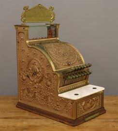 A 1912 NCR Model 313 Brass Candy Store Cash Register.  Wear and minor damage, replaced marquee.   21 3/4" high overall. 