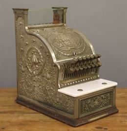 A 1913 NCR Model 313 Brass Candy Store Cash Register.  Wear and minor damage, lacks marquee.  17" high overall.  
