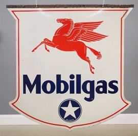 A 1933 Mobilgas Porcelain Sign.  Shield form double sided sign with red Pegasus and white star, marked "I. R. 33" for Ingram-Richardson, 1933.  Wear and loss to the porcelain, some touch-ups.  54" x 54" high overall. 