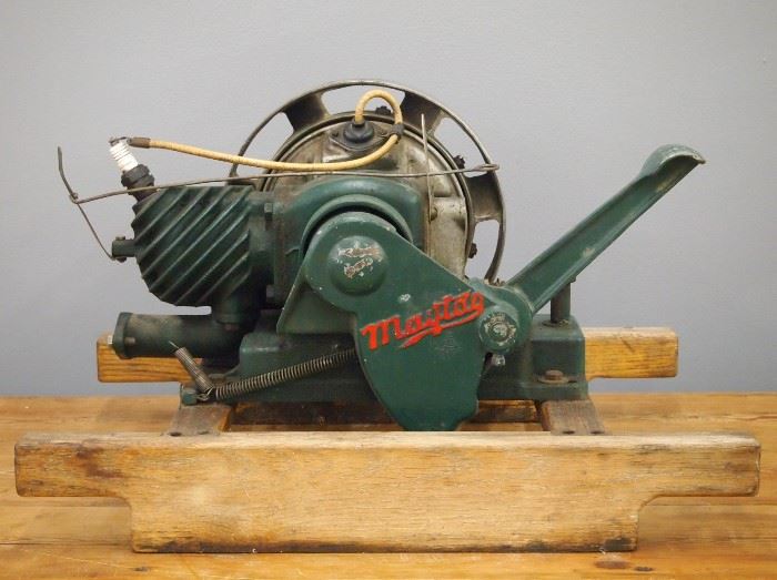 A Vintage Maytag Type FY-ED4 Appliance Engine.  Gas engine with foot pedal start on a wood frame.  Old paint with some wear.  13 1/2" high overall. 