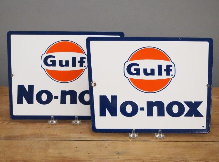 Two mid 20th century "Gulf No-nox" Gas Pump Plates.  Single sided porcelain on steel.  Minor scratching, damage at holes.  Each 11 1/4 x 8 1/2" high.  