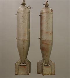 Two WWII Metal Practice Bombs.  Wear and some denting.  Each 44 3/4" long.