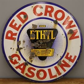 An early 20th century Red Crown Gasoline Co. Porcelain Sign.  Round, double sided sign reads "Red Crown Gasoline Company Ing-Rich (Ingram-Richardson Manufacturing Co.) Beaver Falls, Penn.".   Significant wear, bullet strikes and corrosion.  30" diameter.  