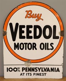 A 1930's Veedol Motor Oils Porcelain Sign.  Double sided sign reads "Buy Veedol Motor Oils 100% Pennsylvania At Its Finest".   Wear and several chipped areas.  22 x 28" high. 