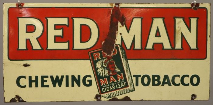 A mid 20th century Red Man Chewing Tobacco Porcelain Sign.  Rectangular single sided sign reads "Red Man Chewing Tobacco".  Significant wear, damage, and some corrosion.  22" long. 