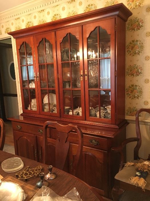Beautiful traditional dining room set in solid cherry by Cresent—table and 6 chairs, china cabinet, and buffet. Wonderful set in excellent condition, just in time for the holidays.