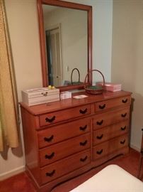Vintage maple dresser with mirror, heat and nightstand (not shown).