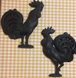 Ceramic pair of rooster wall decor.